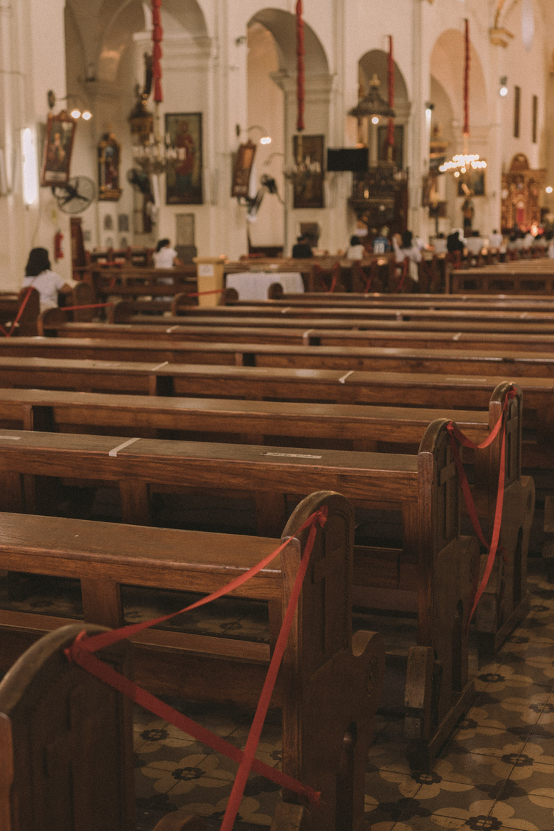Row of Wooden Benches inside a Church